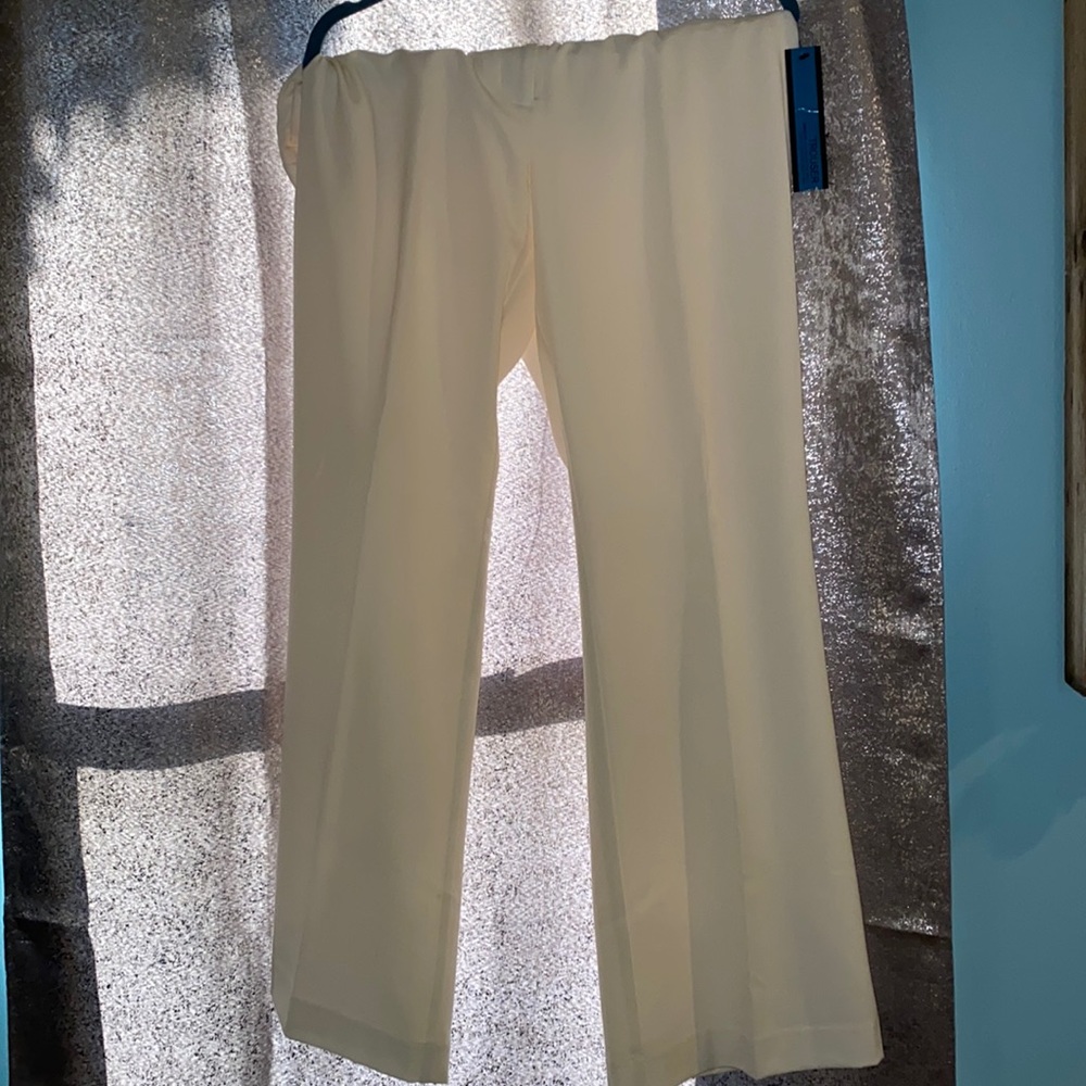 Cream colored dress pants, never worn